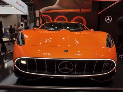 Front view featuring iconic grille and sleek LED headlights