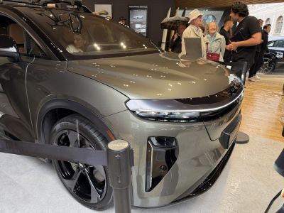 Modern SUV front with sleek LED headlights and black alloy wheels