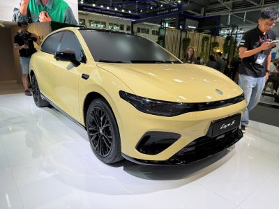 Sleek front profile with aerodynamic shape and black alloy wheels