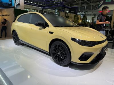 Compact SUV with yellow body and black roof and wheels