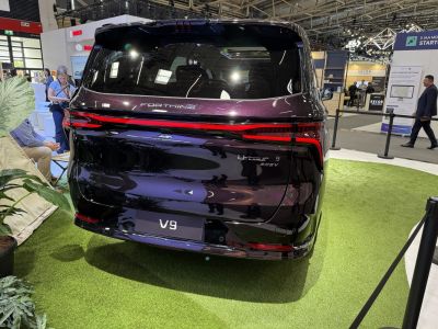 Sleek LED tail lights and rear branding on the vehicle