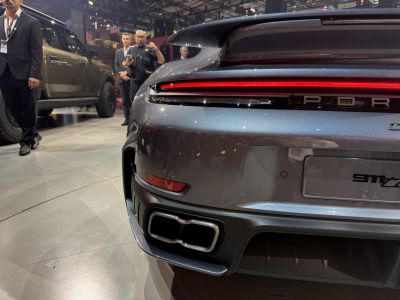 Rear tail light and dual exhaust design of a modern sports car