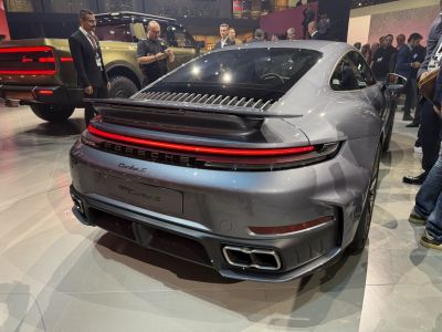 Rear view with spoiler, light bar, quad exhausts