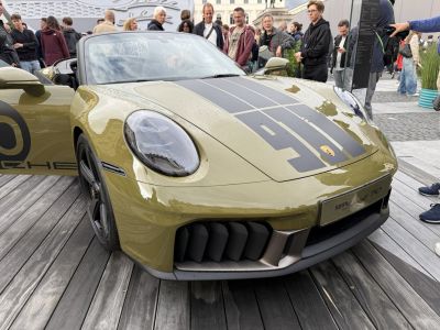 Front close-up of convertible with oval headlights and large front air intakes