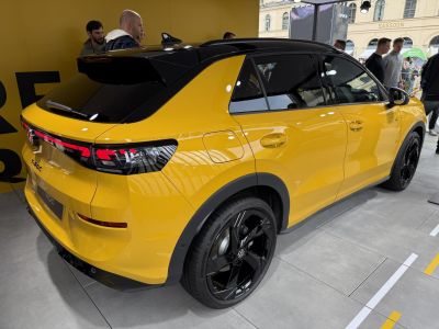 Yellow car with black roof, LED rear lights, and black alloy wheels