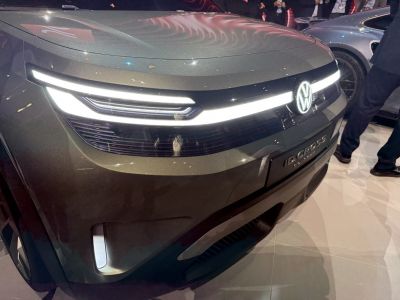 Futuristic front LED light design with integrated light bar and sleek grille