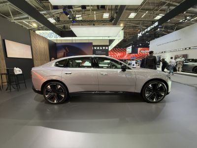 Sleek side profile of an electric sedan with modern rims