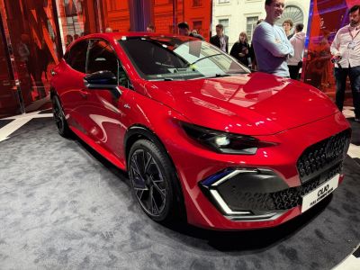 Sleek front design with LED headlights and bold grille