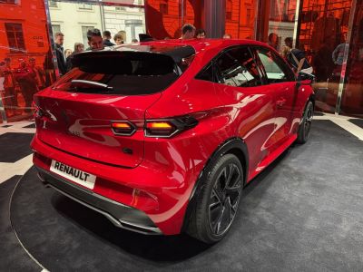 Rear and side view with distinctive taillights and sporty wheels