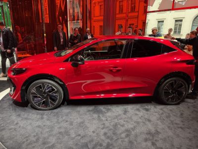 Side profile of sporty hatchback with unique multi-spoke alloy wheels