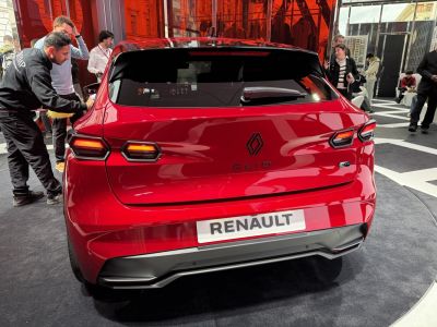 Rear view of a hatchback with distinctive hexagonal taillights and smooth rear design