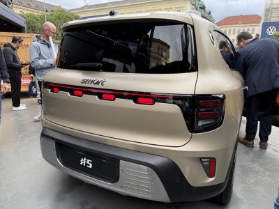 Rear view with distinct LED taillights and hatchback design