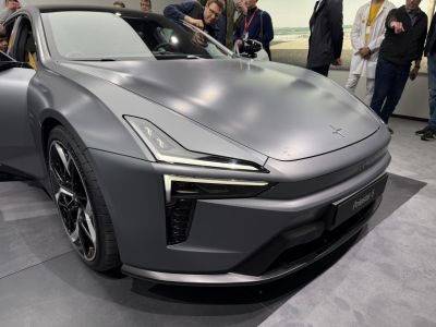 Sleek front with distinctive LED headlights and sporty wheels.