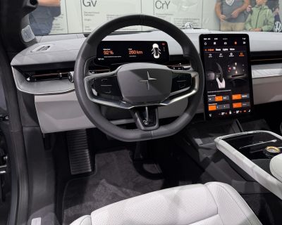 Electric car interior with digital dashboard and large touchscreen display