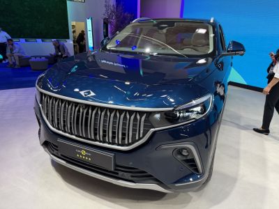 Detailed front grille and headlight with fog light assembly