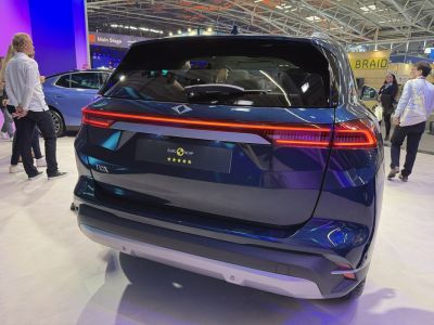 Full-width rear LED light bar with badge and rear window wiper.