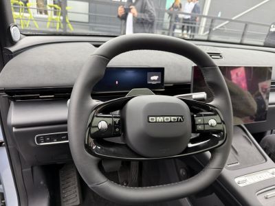 Modern steering wheel with dual digital screens and sleek controls