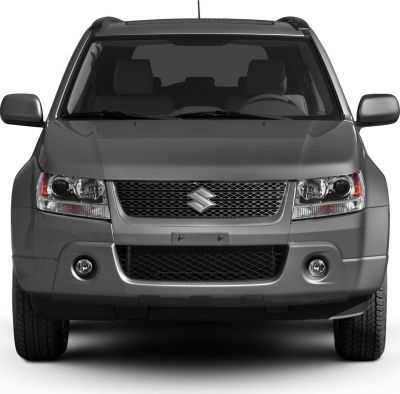 SUV front view with mesh grille and dual round fog lights