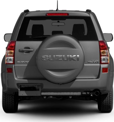 SUV rear view with spare wheel cover and vertical taillights