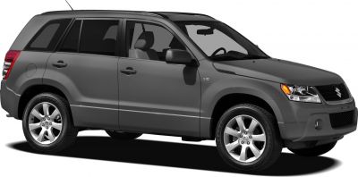 Side profile of mid-size SUV with V6 badge and alloy wheels