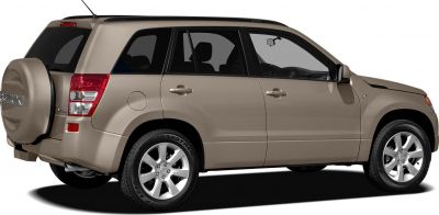 SUV with rear spare wheel cover and alloy wheels in beige