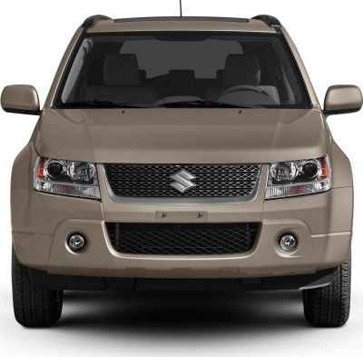 Front grille and headlights of an SUV in beige