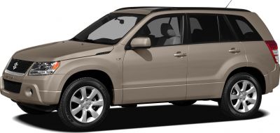 Front side view of SUV with V6 badge and alloy wheels