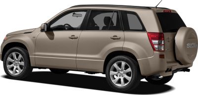 Rear-side profile of SUV with spare tire cover and alloy wheels