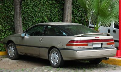 Rear side view of a coupe with light bar and integrated spoiler