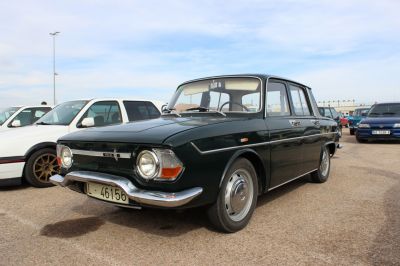 Classic vintage sedan with distinctive front and round headlights