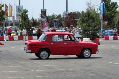 Vintage classic boxy sedan with chrome bumpers and steel wheels