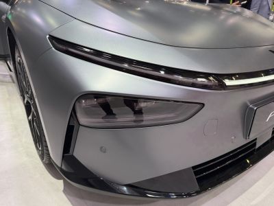 Sleek narrow LED headlights and smooth front bumper design