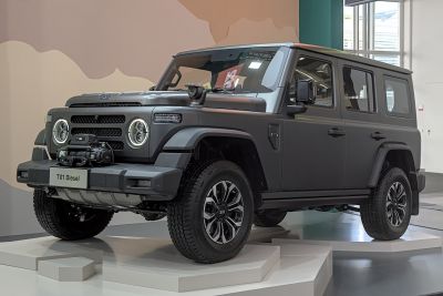 Diesel SUV with round LED headlights and front winch