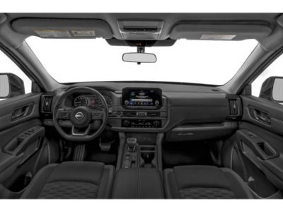 Modern SUV interior with dashboard, touchscreen, and steering wheel