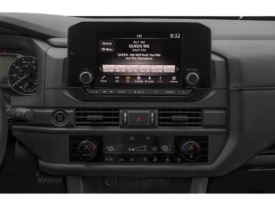 Infotainment touchscreen and dual-zone climate control on modern dashboard