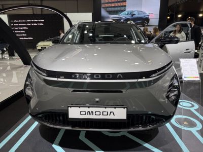 Front view with sleek headlights and updated grille design