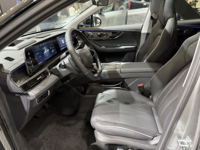 Digital dashboard and leather seats in modern car interior
