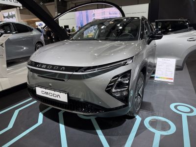 Sleek front view with integrated LED headlights and aerodynamic grille design