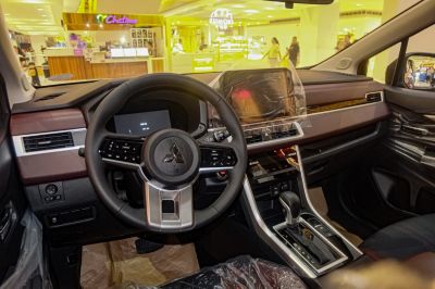 Modern steering wheel and digital dashboard with touchscreen display