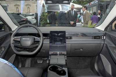 Digital dashboard and large vertical central touchscreen with modern steering wheel
