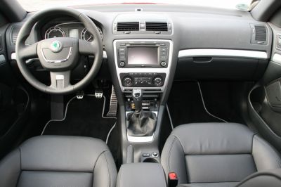 Black leather seats and manual gear shift with central control panel