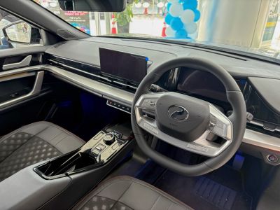 Modern car dashboard and multifunction steering wheel with digital display