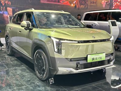 Compact electric SUV front with distinctive vertical LED headlights