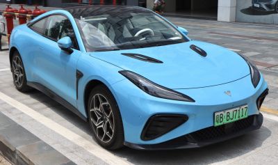 Sporty coupe with aerodynamic hood vents and sharp LED headlights