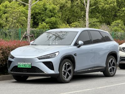 Electric SUV with aerodynamic wheels and LED headlights