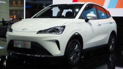 Front LED headlights and alloy wheels on a modern white compact SUV