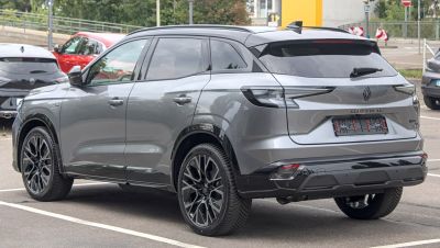 Sleek rear and side view of a modern SUV with alloy wheels and LED taillights
