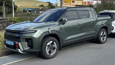 Modern electric pickup with distinctive LED front and aerodynamic design