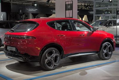 Rear and side profile with sleek tail lights and sporty alloy wheels.