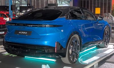 Blue rear view with futuristic wheels and LED lights